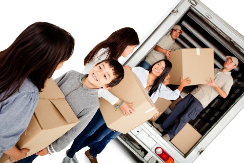 Man and van team preparing items safely for transport