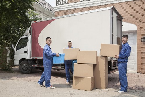 Westham man and van staff assessing items and handling them carefully