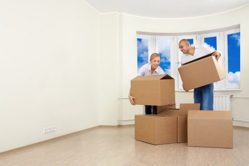 Moving boxes and furniture from a student flat in West Ham