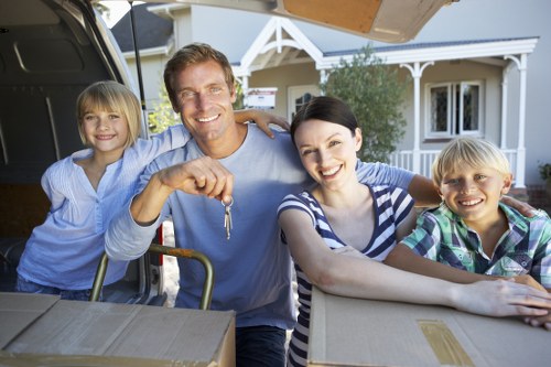 Careful loading of large household furniture for transport
