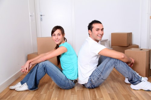 Westham moving team arranging packed boxes for a smooth relocation