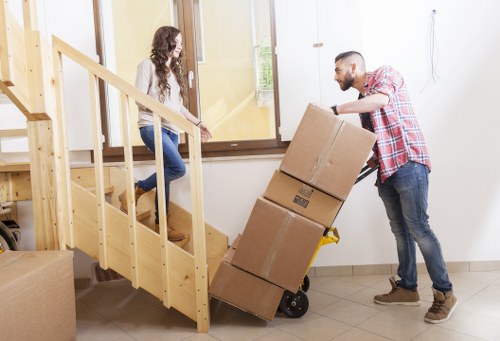 Cardboard boxes and protective packing items ready for relocation