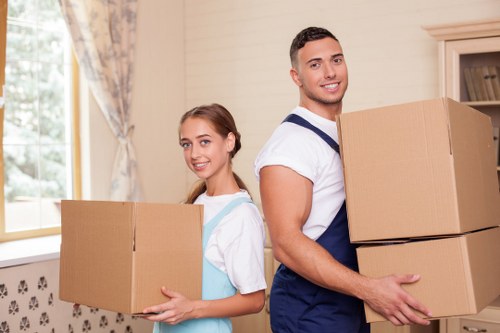 Trusted Westham movers unloading furniture into a new home