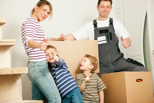 Packing boxes and fragile items for a flat move in Westham
